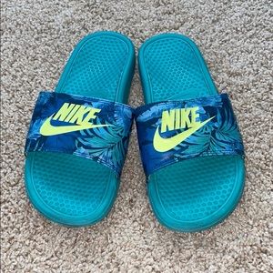 Tropical print teal Nike slides, neon green logo